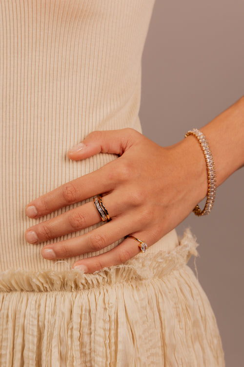 ANILLO ONDAS ZIRCONIAS TRIANGULO