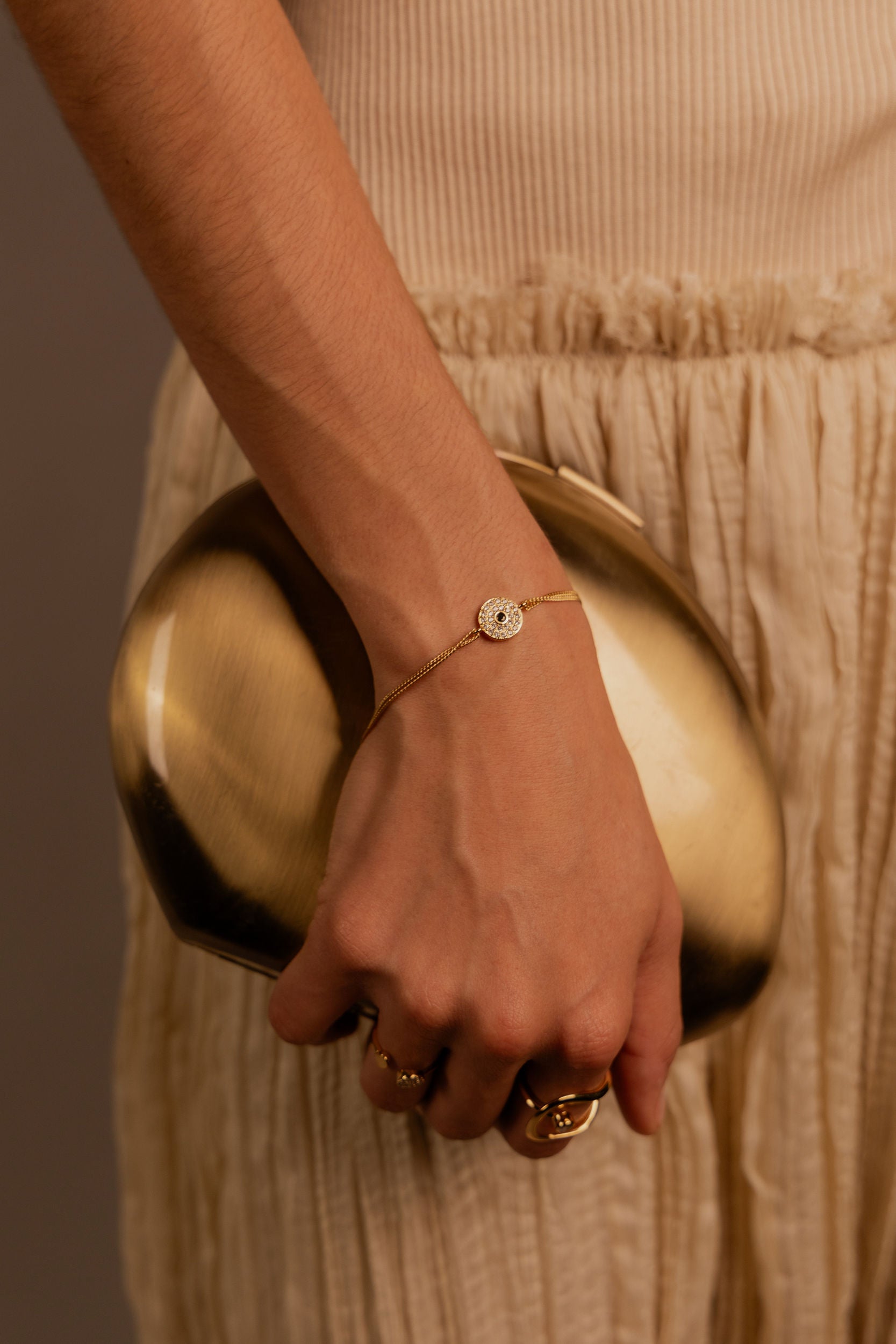 PULSERA MEDALLA OJO ZIRCONIAS